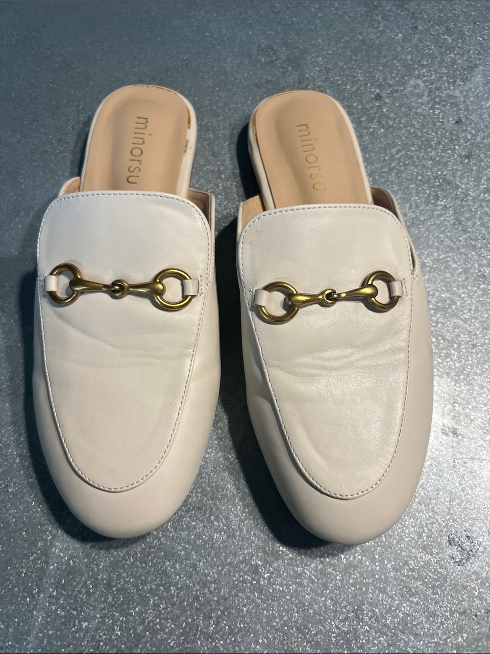 Cream faux Leather Slip-On Mules with Gold Horsebit.